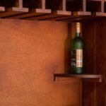 Caldriven | Acacia Wood Bar Cabinet with Glass Holder Rack, Glass Display Doors and Carved Detailing in Natural Finish – Wooden Slice - Image 4
