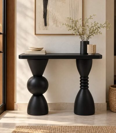 Solid Wood Console Table with sculptural geometric legs in black finish.