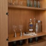 Rovellique | Solid Wood Tall Bar Cabinet with Raised Panel Doors and Black Metal Stand in Brown Finish – Wooden Slice - Image 5