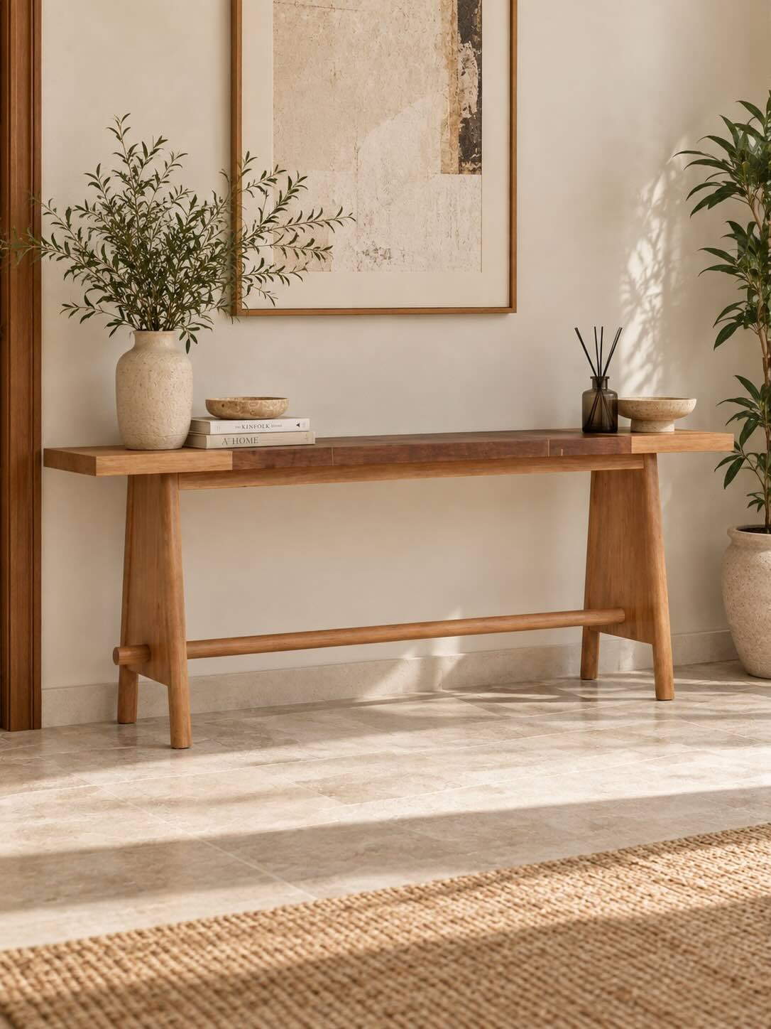 Tavero Oak Wood Console Table with Trestle Base in White Oak Finish Oak Wood Console Table with minimalist trestle base in White Oak finish.