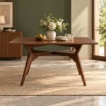 Alderwick solid wood angular leg dining table with walnut brown rectangular tabletop and intersecting wooden trestle supports.
