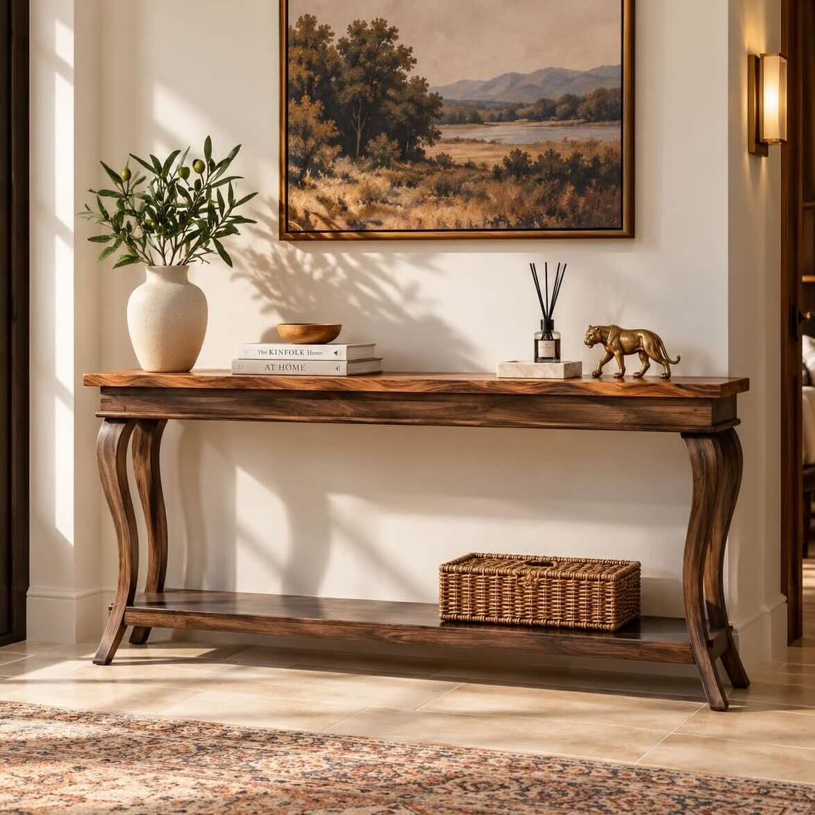 Aldevra Sheesham Wood Console Table with Curved Legs in Warm Chestnut Finish Sheesham Wood Console Table with sculptural curved legs, two-tone rectangular top and open lower wooden shelf.