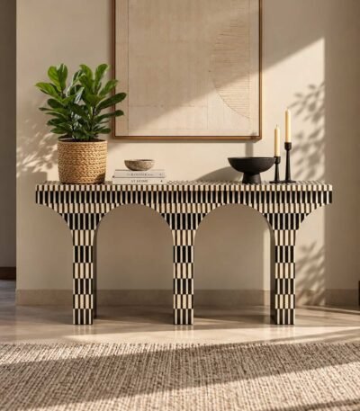 Bone Inlay Console Table with black and ivory checkerboard pattern, three vertical supports and two arched openings.