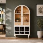 White arched solid wood bar cabinet with glass doors, natural wood interior, drawers, and wine bottle cubbies