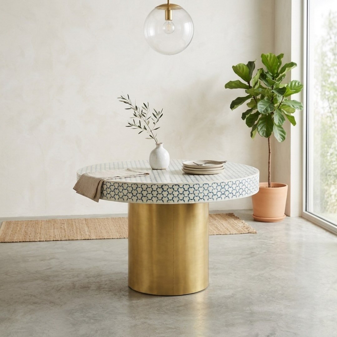 Aurevyn Blue and White Round Bone Inlay Dining Table Aurevyn round bone inlay dining table with blue and white geometric pattern and gold-tone cylindrical base