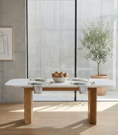 Caldrisse marble top dining table for six with natural solid wood base and sculpted fluted legs