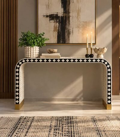 Bone Inlay Console Table with black finish, ivory floral motifs, curved waterfall legs and gold-toned base accents.