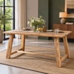 Haven A-Frame Mango Wood Trestle Dining Table with angled wooden legs, rectangular tabletop and natural finish.