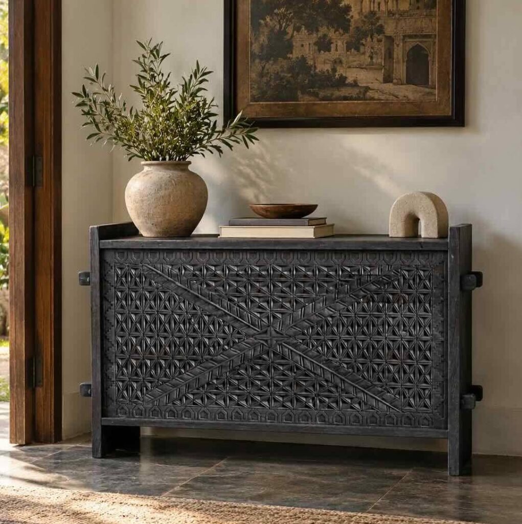 Carved Wooden Storage Trunk with geometric hand-carved front, crossed detailing and black matte mango wood finish.