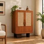 Mavrenza sheesham wood bar cabinet with woven cane doors, sculpted wooden handles and glass holder in natural finish