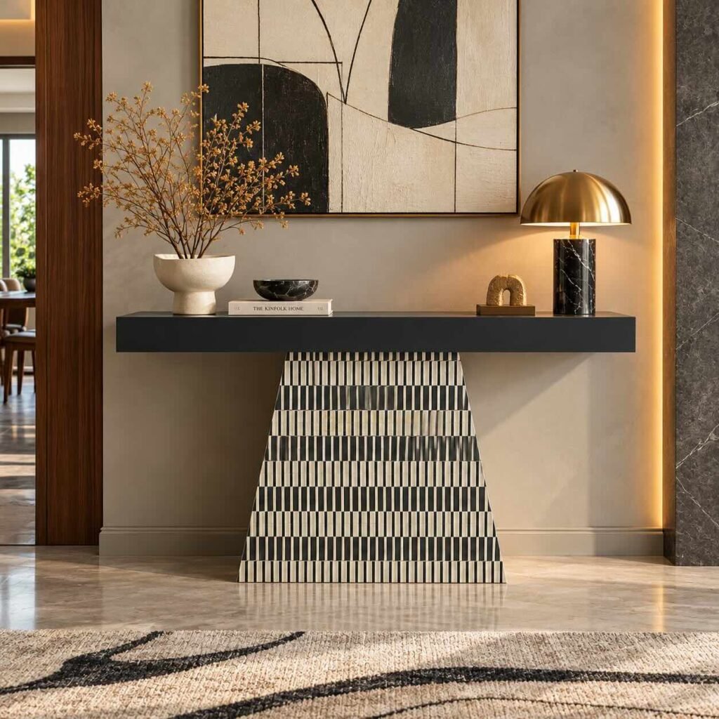 Bone Inlay Console Table with black rectangular tabletop and black and ivory striped trapezoid pedestal base.