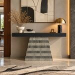 Bone Inlay Console Table with black rectangular tabletop and black and ivory striped trapezoid pedestal base.