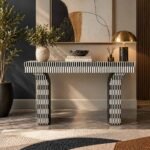 Bone Inlay Console Table with black and white geometric stripes, rectangular tabletop and sculptural arched wooden legs.
