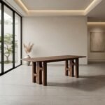 Orvello solid acacia wood six seater dining table with sculptural arch legs in natural brown finish