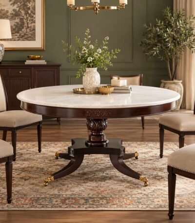 Rosewood Round Centre Table with light-coloured circular tabletop, carved central pedestal, curved wooden legs and brass-toned feet.