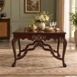 Scrollhaven Carved Rosewood Dining Table with rectangular top, ornate floral apron, cabriole legs and natural/gold finish.