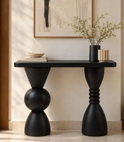 Solid Wood Console Table with sculptural geometric legs in black finish.