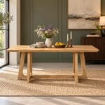 Treston natural wood trestle dining table for six people with rectangular tabletop, A-frame wooden legs and horizontal stretcher.