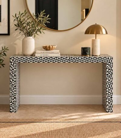 Bone Inlay Console Table with black and ivory geometric triangle pattern, rectangular tabletop and waterfall-style panel legs.