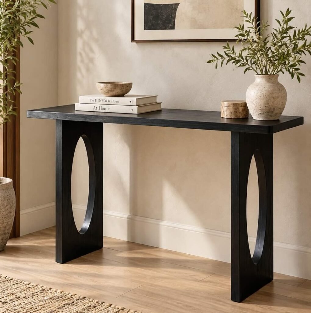 Sheesham Wood Console Table with sculptural oval cut-out legs in black finish.
