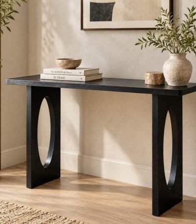 Sheesham Wood Console Table with sculptural oval cut-out legs in black finish.