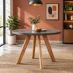 Zenvora 6 seater round dining table with dark textured tabletop and natural wood sculpted legs